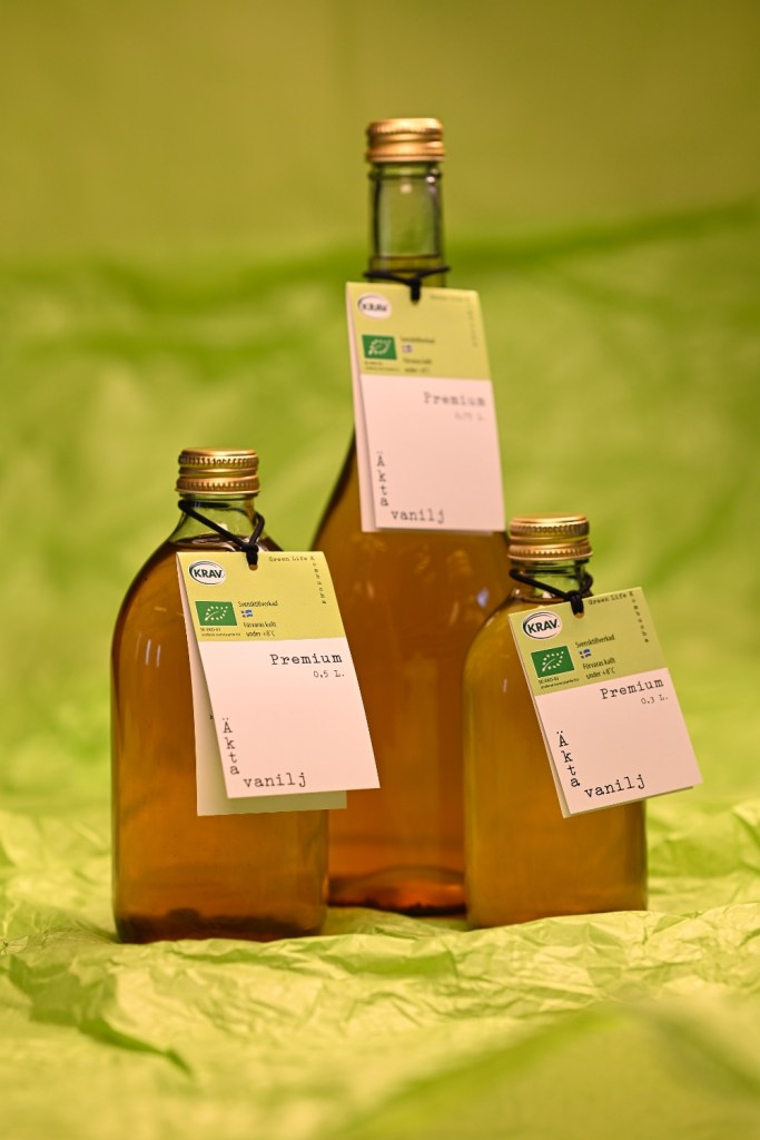 Flaskor med Green Life Kombuchas kombucha med äkta vanilj.